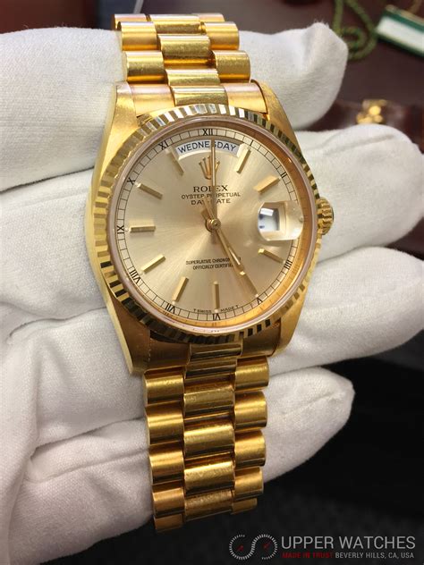 solid gold rolex day date.